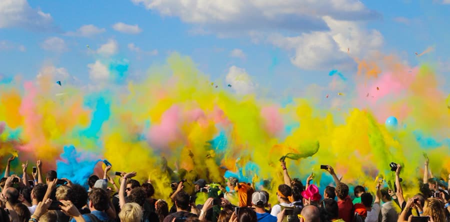 Friends celebrating Holi with colors